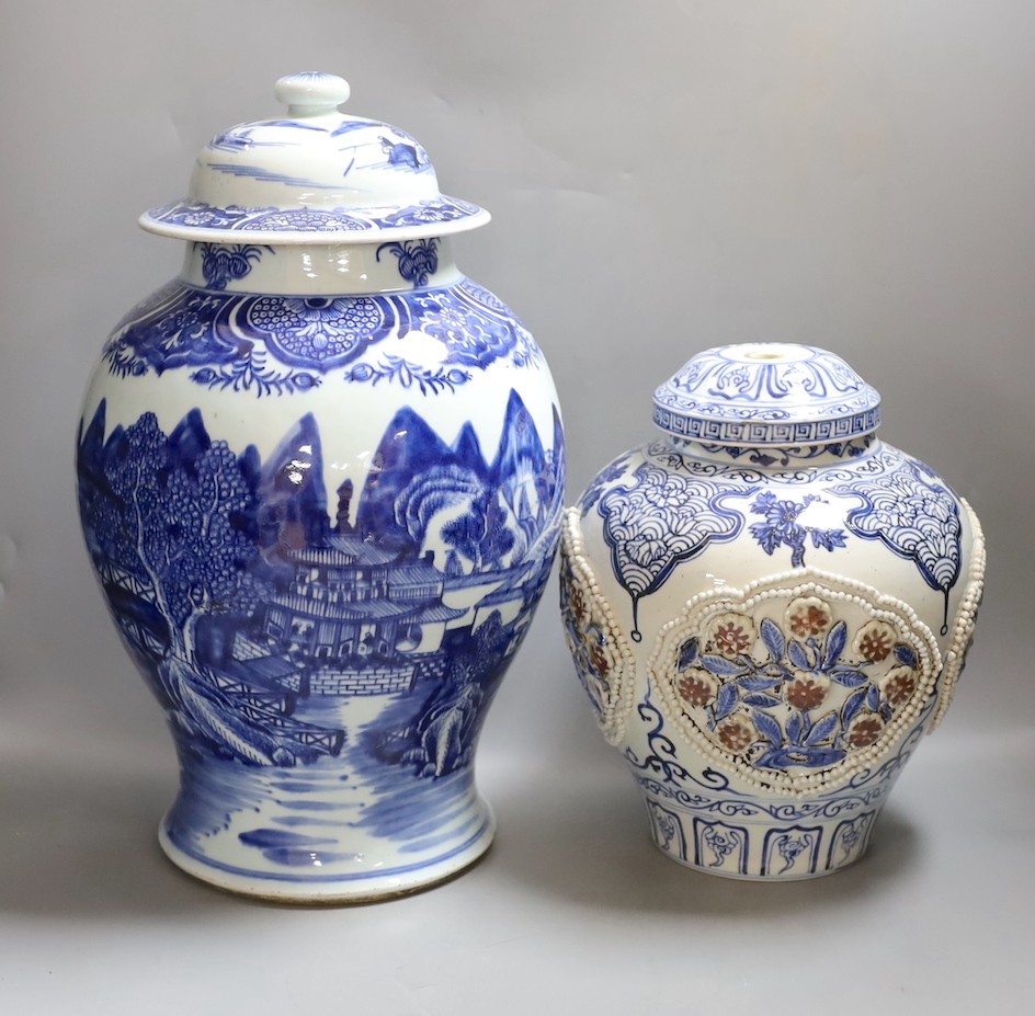 A large Chinese blue and white jar and cover and a blue and white jar and cover, 19th-century and later. Largest 44cm